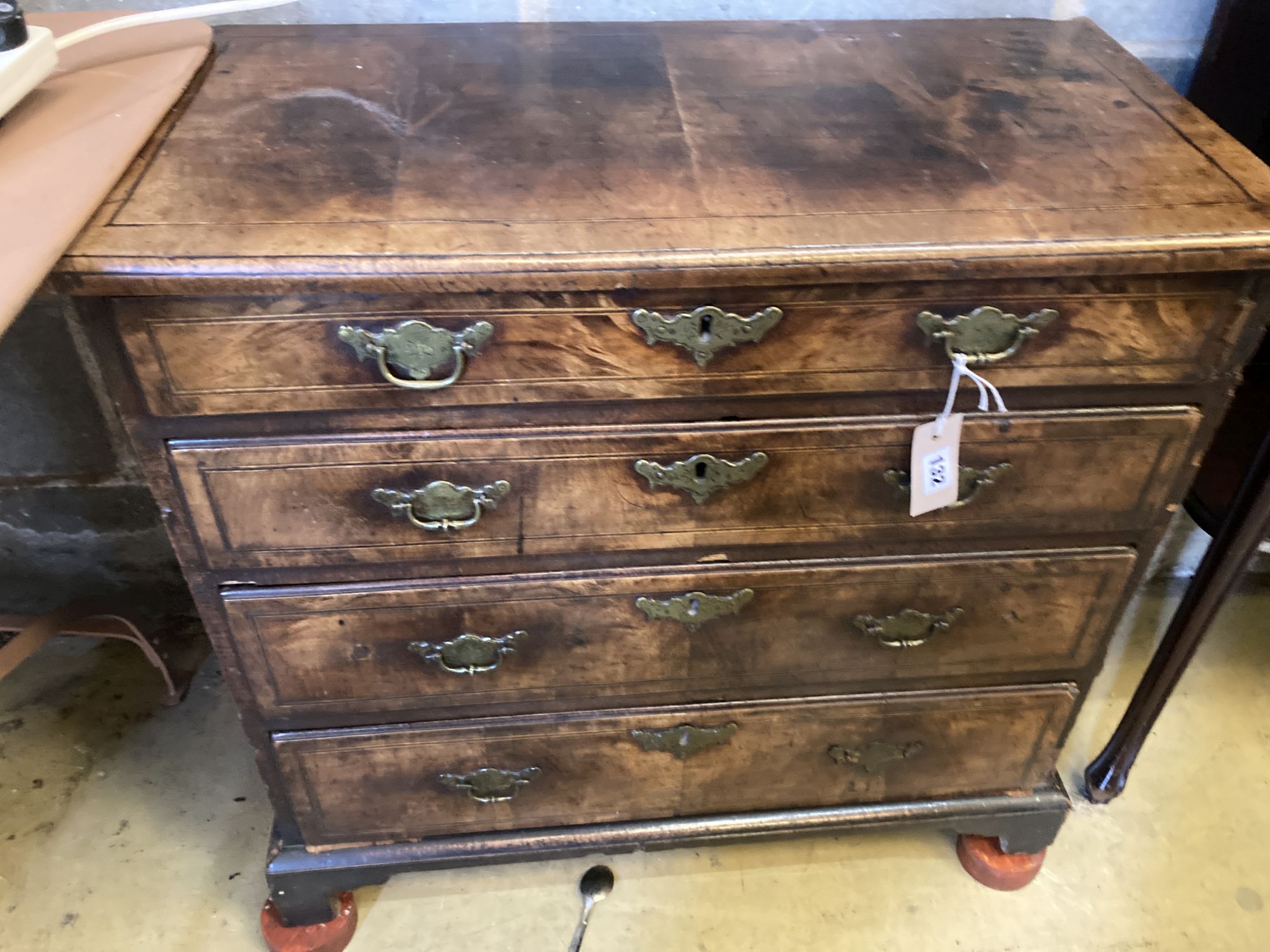 A small 18th century walnut chest of drawers, width 74cm, depth 39cm, height 73cm